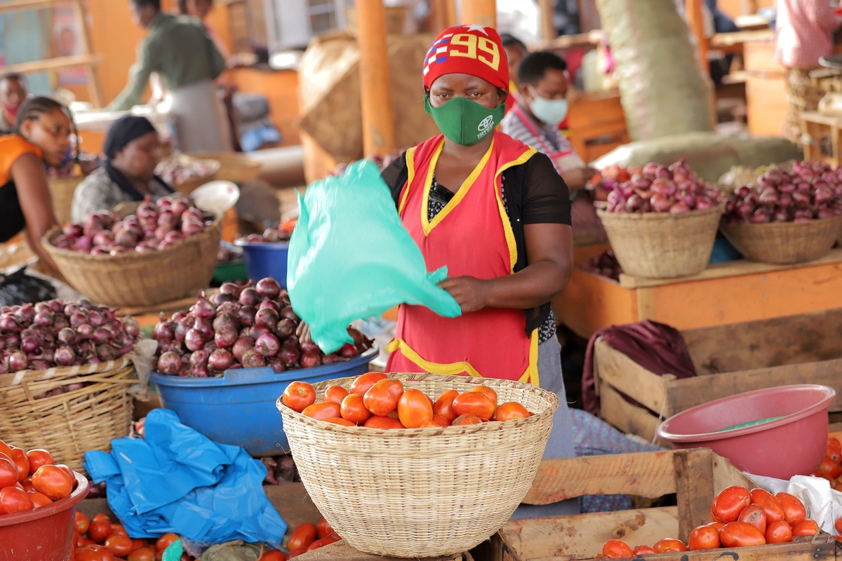 Informal vendor in a market in Kampala, Uganda